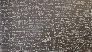 Chalkboard full of math.
