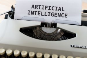 Typewriter that says "artificial intelligence."